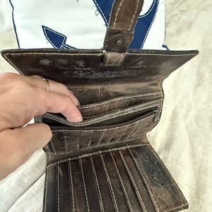 Distressed wallet. Excellent condition.
